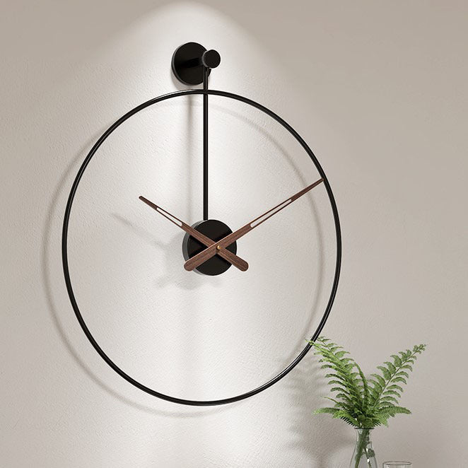 Horloge murale design moderne 40cm, cadran minimaliste noir et aiguilles or, parfaite pour décoration intérieure élégante.