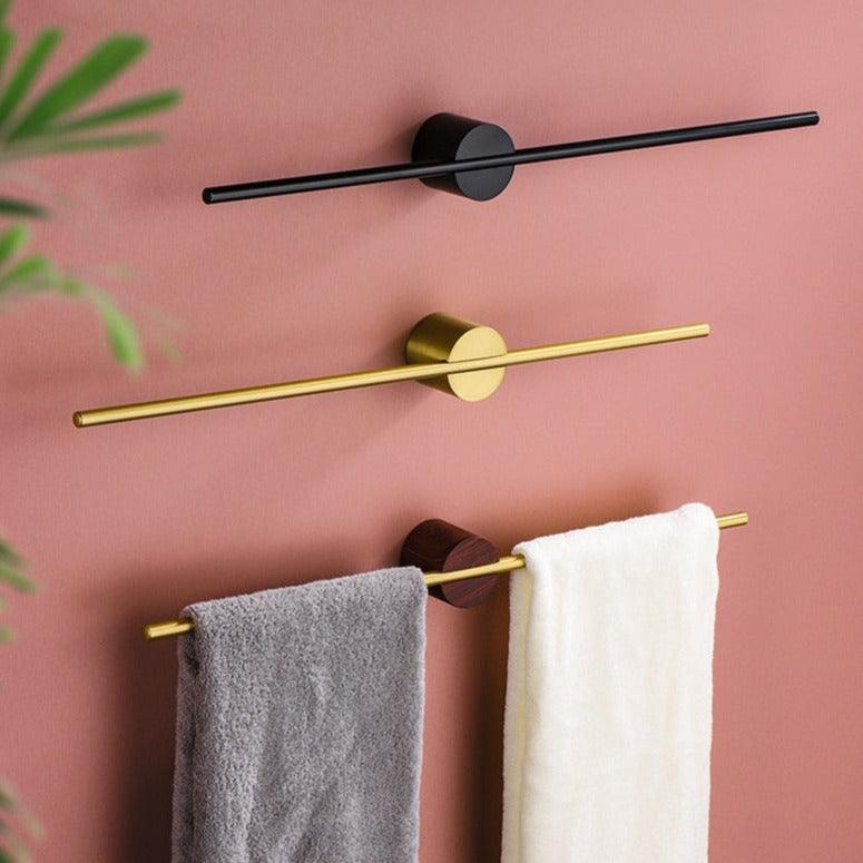 Porte-serviettes mural en métal noir, design minimaliste moderne pour salle de bain.