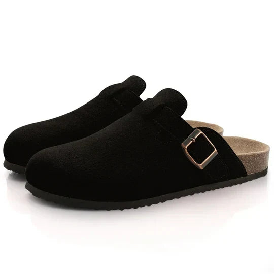 Mules femme noires décontractées. Sandales à soutien du pied, parfaites pour le confort quotidien et la mode été.