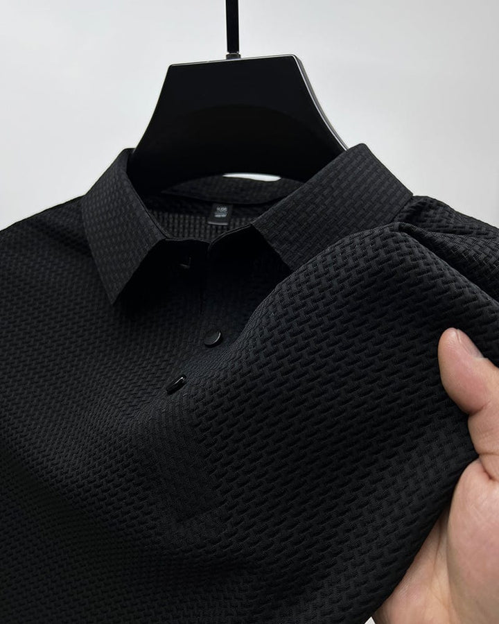 Polo structuré polyvalent pour homme, idéal printemps/été, allie élégance et style décontracté moderne.