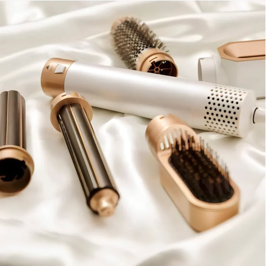 Appareil coiffure 5-en-1 pour tous types de cheveux. Sèche, stylise, boucle, lisse et apporte du volume.
