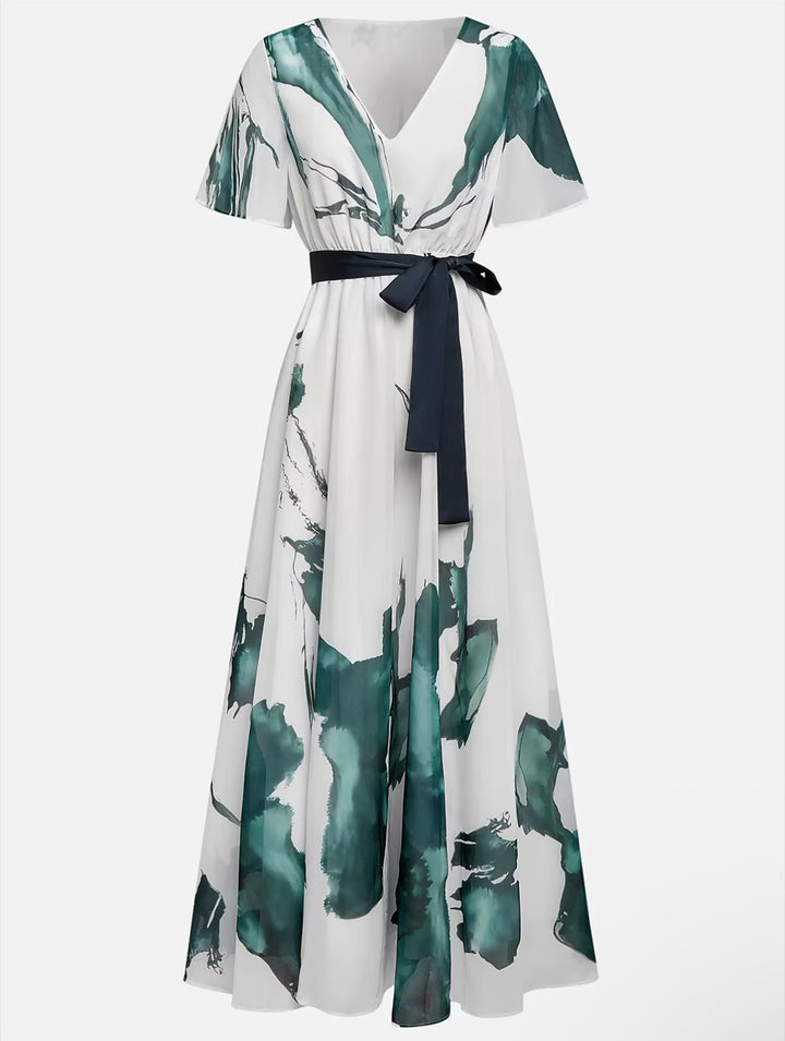 Robe élégante femme imprimé aquarelle. Robe longue fluide et chic, parfaite pour un mariage ou une soirée estivale.