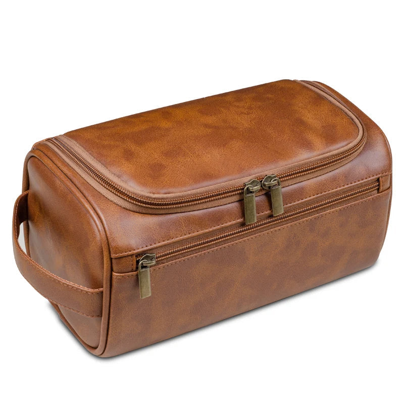 Trousse de toilette de voyage luxe noire en cuir synthétique, imperméable et élégante pour hommes et femmes.