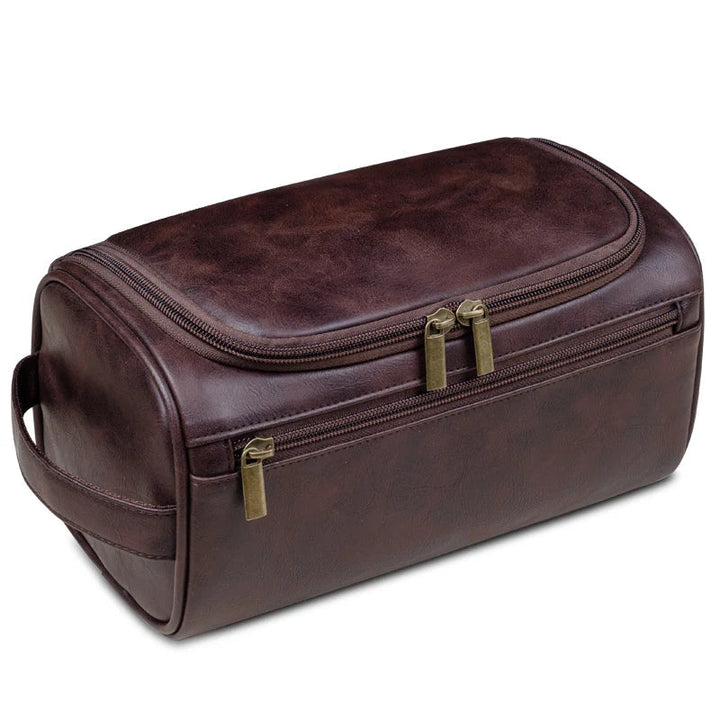 Trousse de toilette Voyago en cuir synthétique, design marron imperméable pour rangement sûr des articles de toilette.