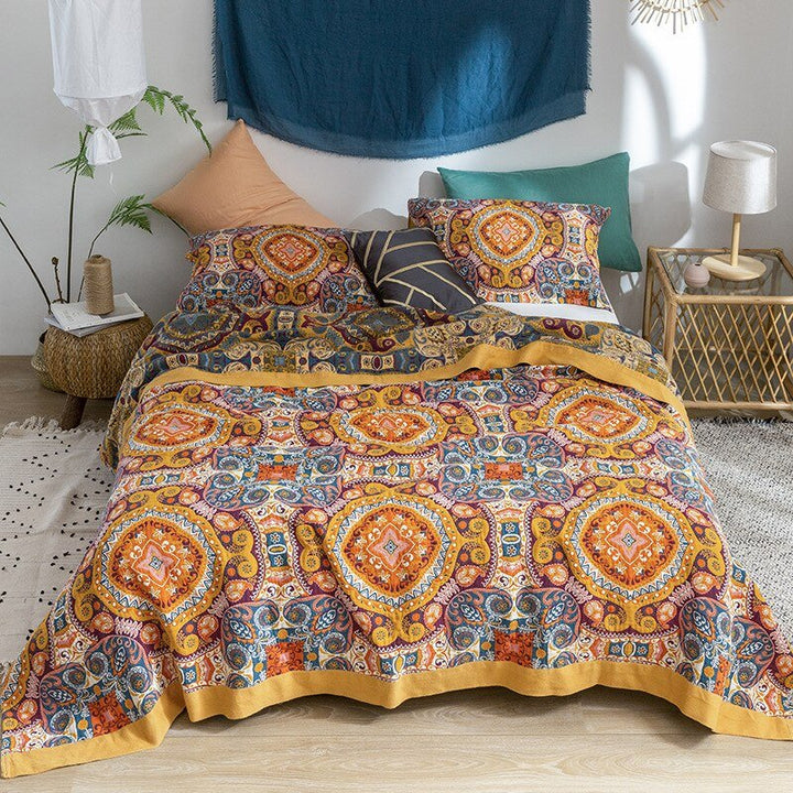 Couverture décorative en coton, inspiration bohème scandinave, pour un intérieur cosy et stylé.