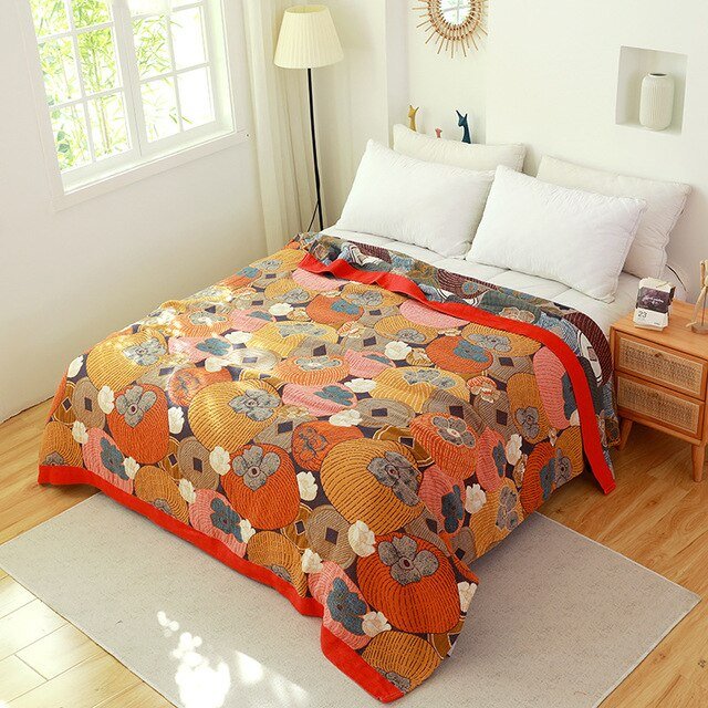 Plaid bohème en coton pour canapé, style scandinave épuré, idéal pour une ambiance cosy et moderne.