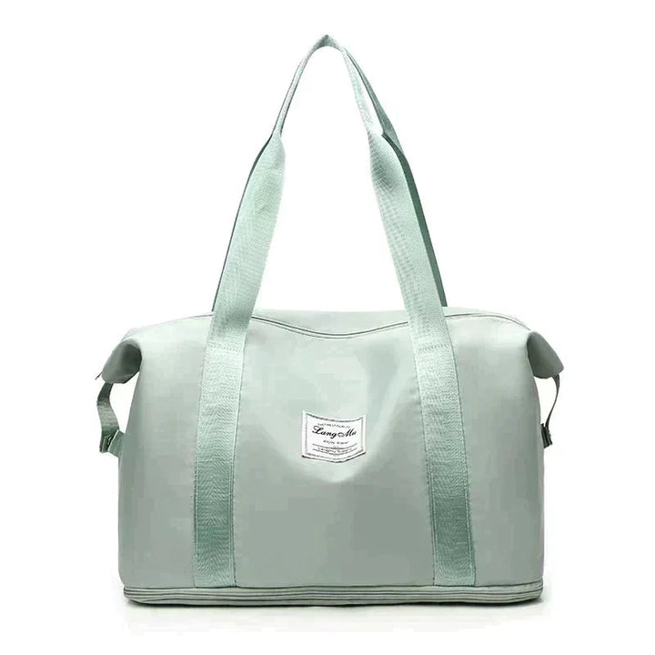 Sac de sport et voyage pour femmes, pliable, imperméable, avec poignées robustes, facile à transporter.