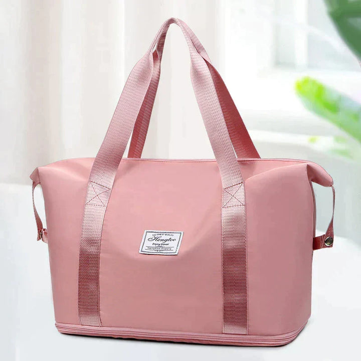 Sac de sport femmes, grand format, pliable et imperméable, parfait pour la salle de sport ou les voyages.