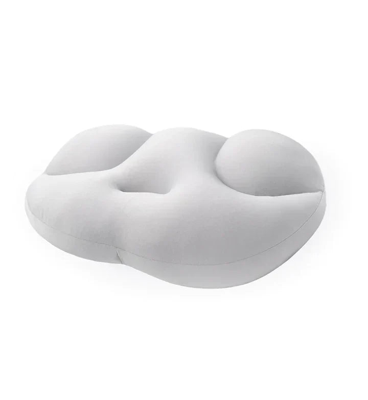 Oreiller ergonomique universel offrant un soutien cervical optimal pour un sommeil réparateur et confortable.