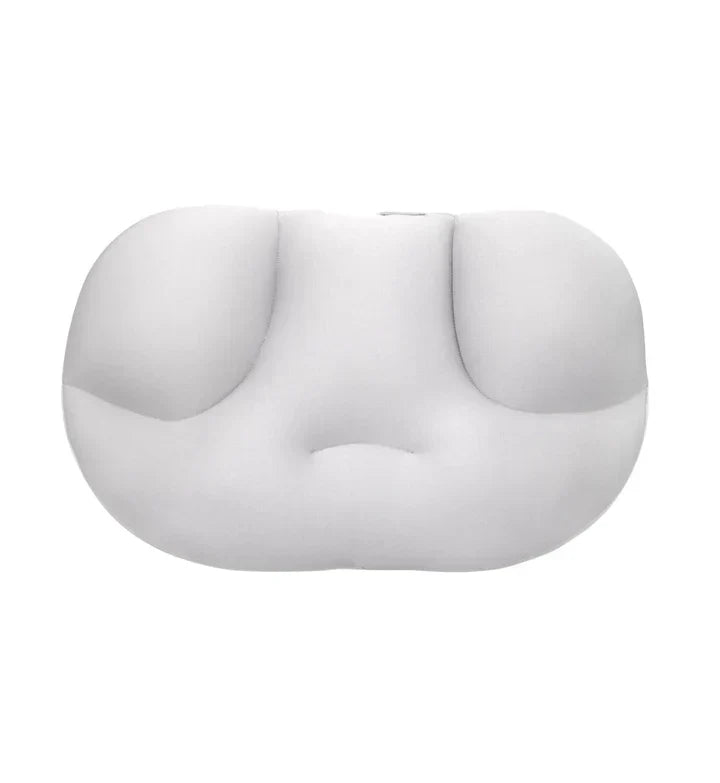 Détail de l'oreiller ergonomique, conçu pour s'adapter à toutes les positions de sommeil avec un soutien optimal.