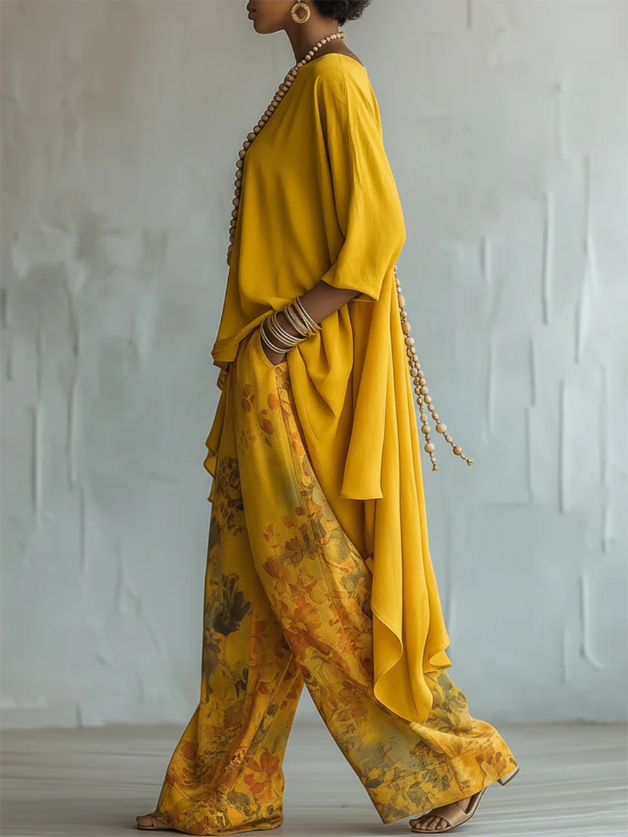 Pantalon floral fluide et léger, associé à un haut asymétrique, ensemble bohème femme pour un confort élégant en été.