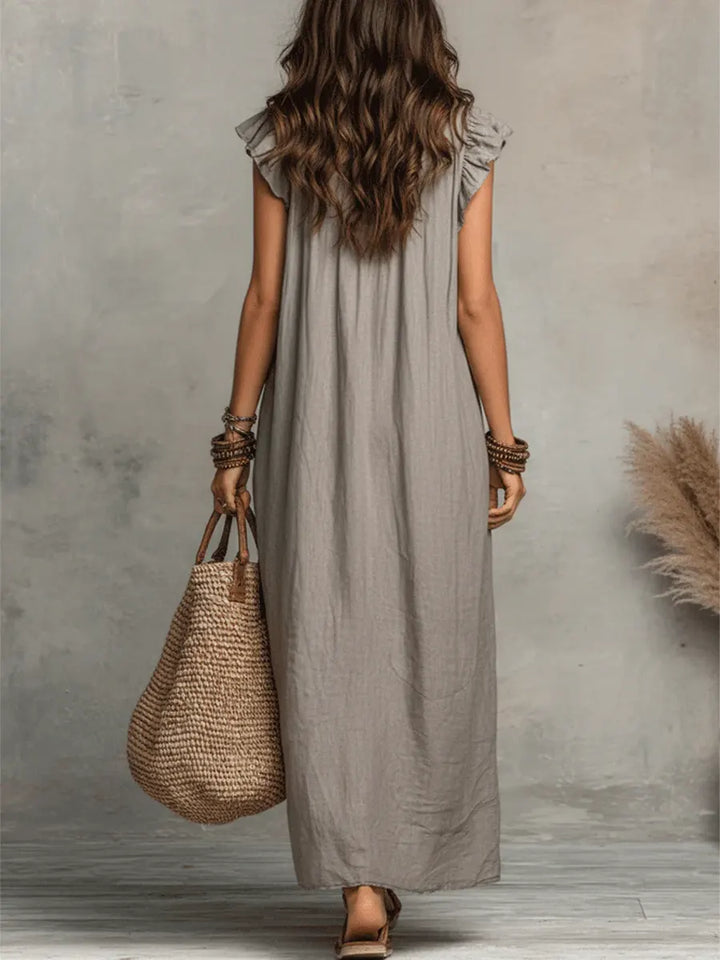 Robe élégante femme en lin coton, coupe fluide, style bohème pour les journées d'été.