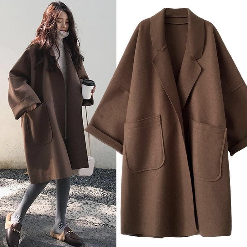 Manteau long oversize femme élégant brun, double boutonnage, avec ceinture. Idéal hiver/automne chic.
