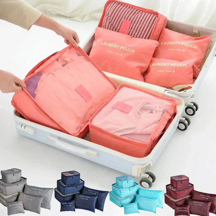 Ensemble de sacs de rangement de voyage en tissu Oxford gris pour valise organisée et voyage simplifié.