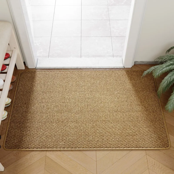 Paillasson d'entrée aspect jute naturel, idéal intérieur/extérieur, pour une maison propre et accueillante.