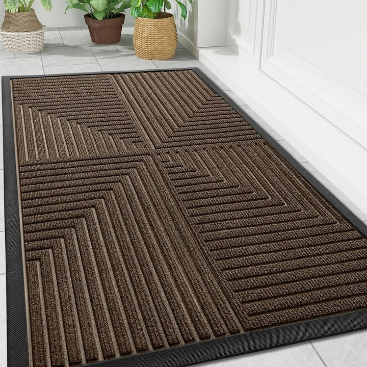Paillasson d'accueil extérieur robuste, parfait pour retenir boue et poussière. Surface antidérapante pour votre maison.