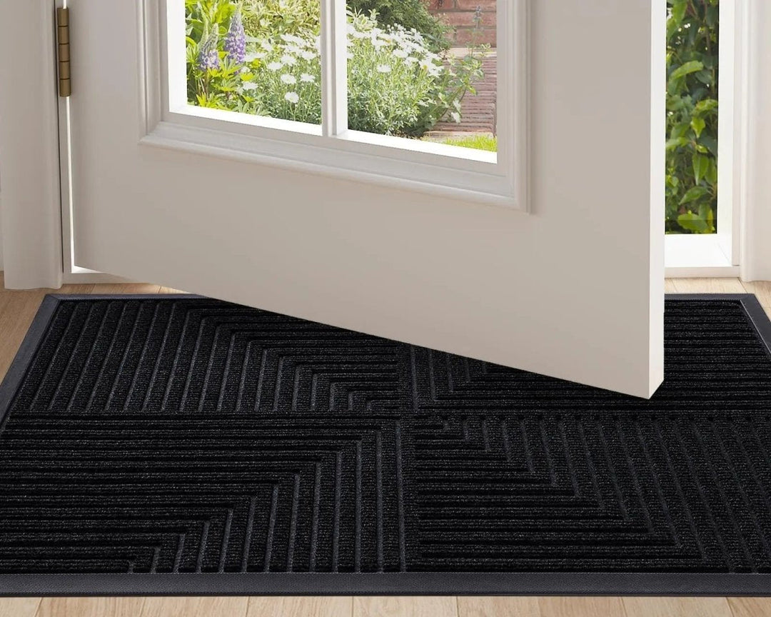 Paillasson moderne d'extérieur, haute performance anti-poussière et antidérapant. Parfait pour une entrée de maison impeccable.