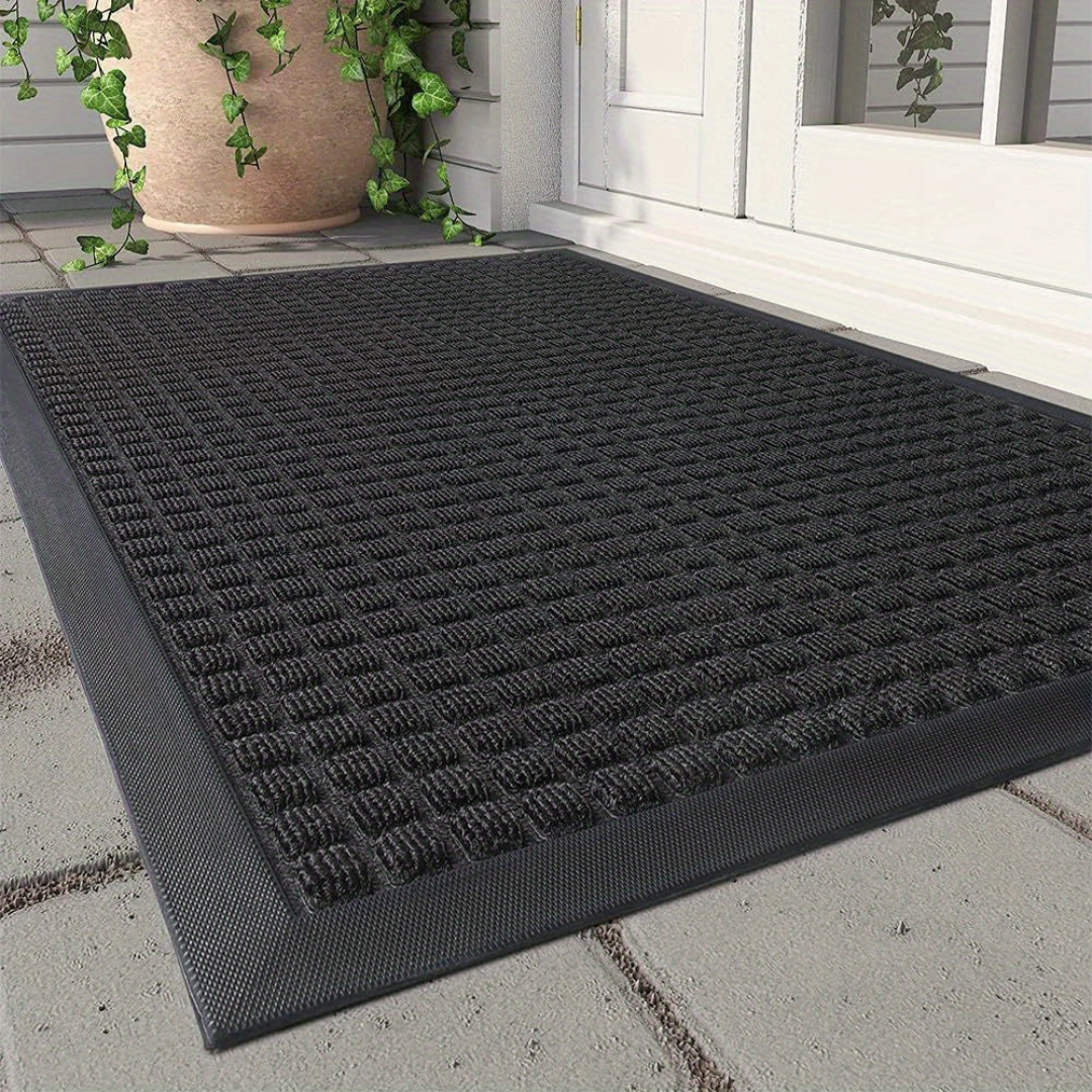 Paillasson élégant en polypropylène, durable, pour entrée maison. Idéal intérieur/extérieur, garde la propreté.