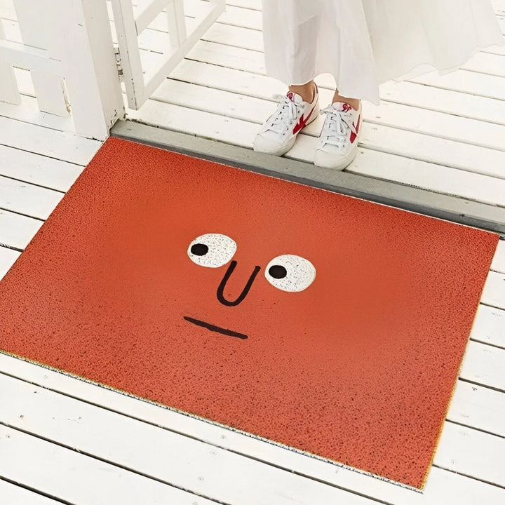 Paillasson décoratif smiley jaune, antidérapant, égaye l'entrée. Tapis ludique pour intérieur ou extérieur.