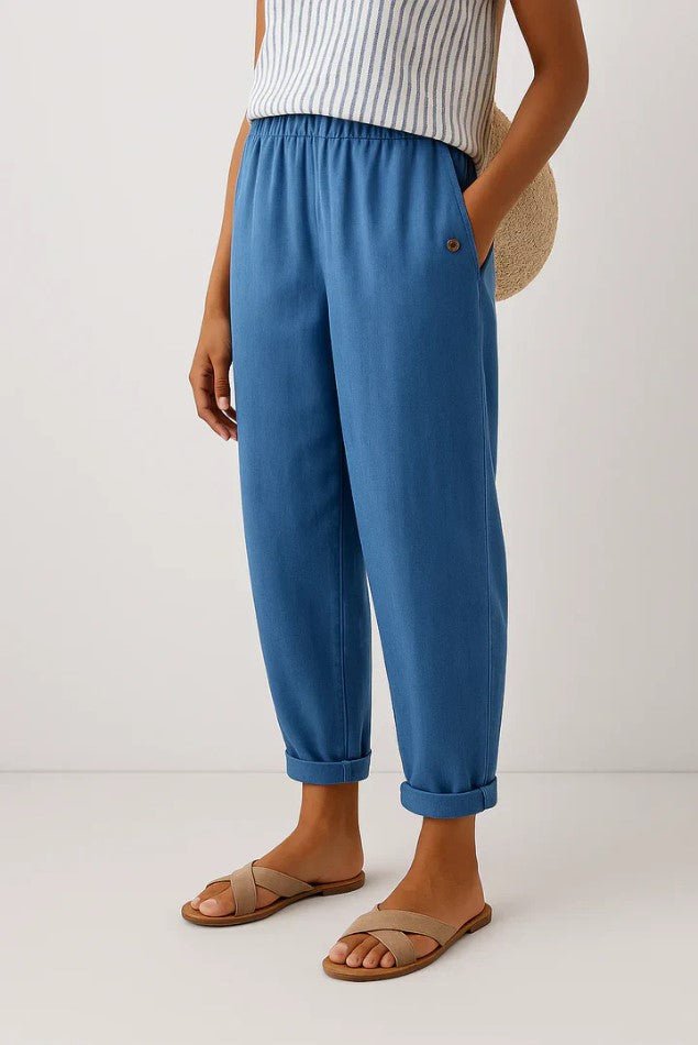 Pantalon confortable femme, jambe large, mélange lin et coton. Taille élastique pour liberté de mouvement.