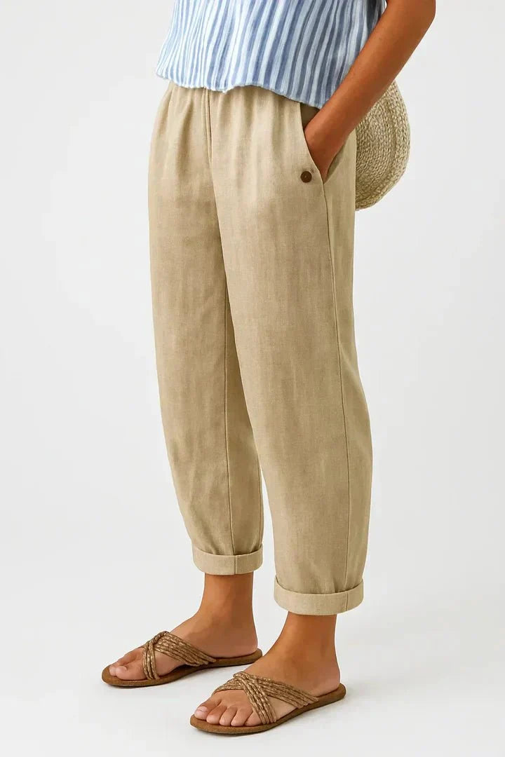 Pantalon femme jambe large en lin et coton, taille élastique. Confort et style décontracté pour look fluide.