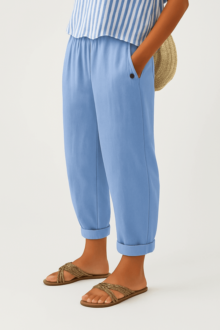 Pantalon femme moderne, jambe large et fluide en lin-coton. Taille élastique pour un style élégant et confort.