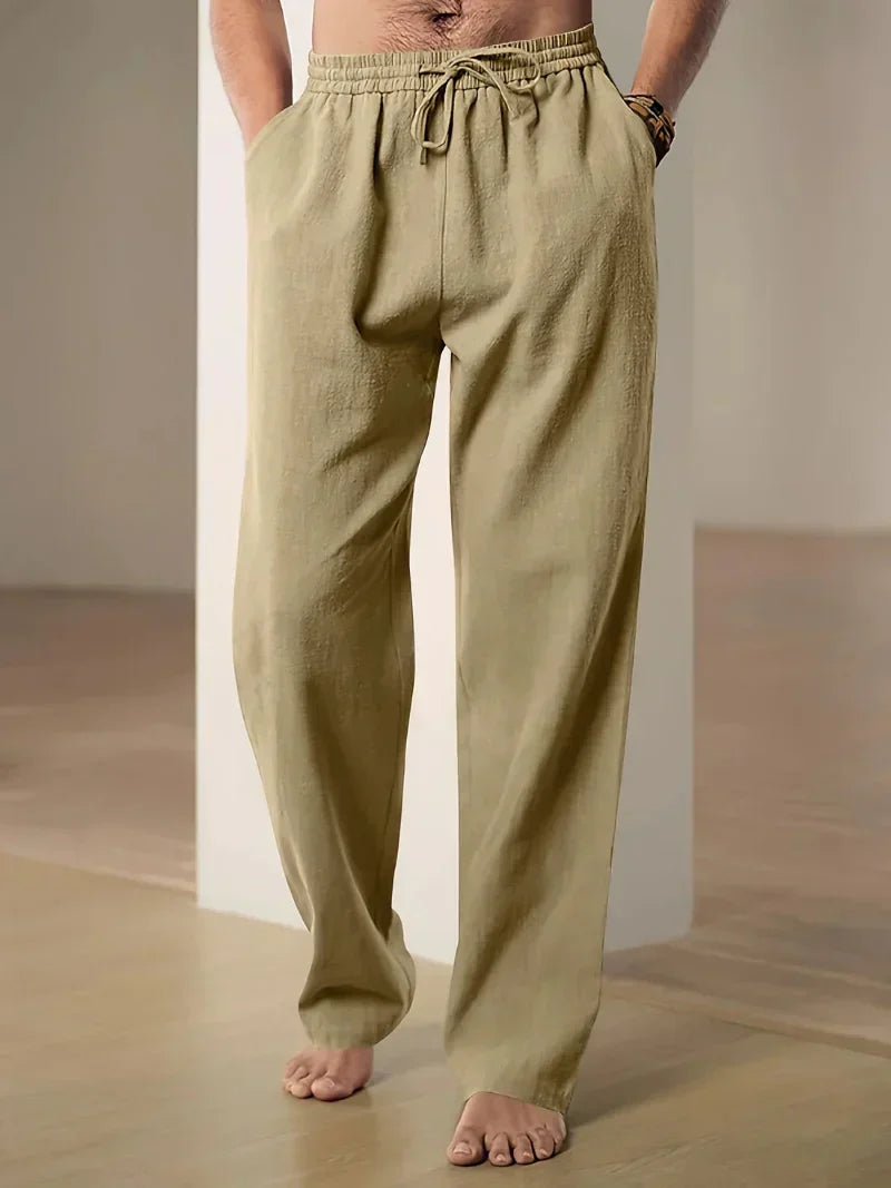 Pantalon de détente homme confortable, coupe ample. Avec cordon de serrage et poches, parfait pour un look casual.