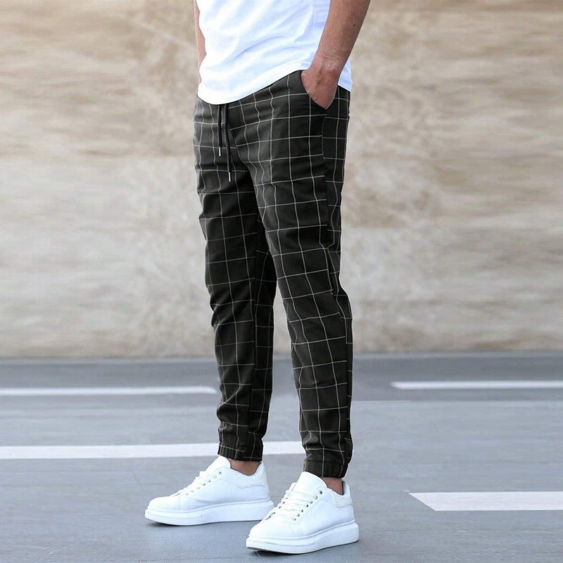 Jogging homme confortable à carreaux, parfait pour la détente ou un sportswear élégant au quotidien.