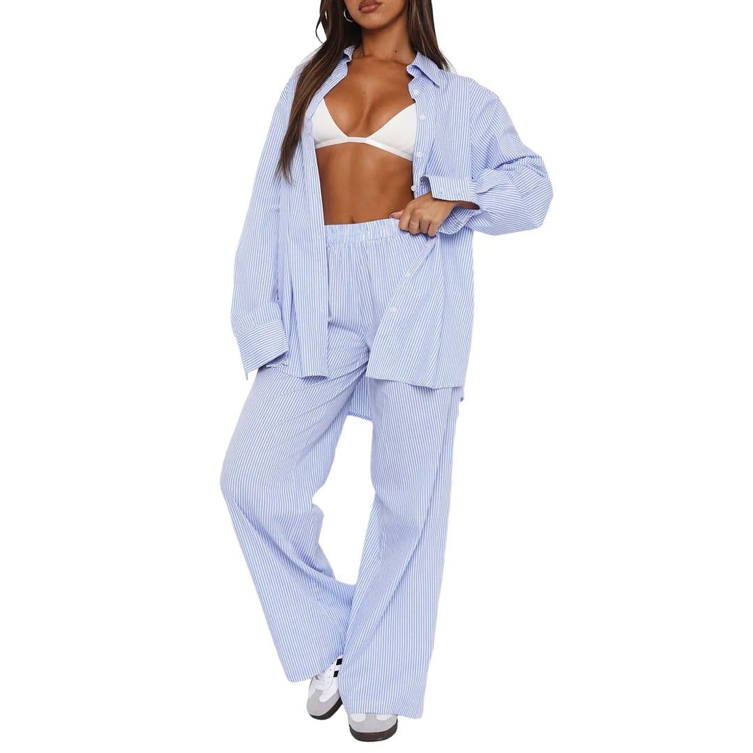 Pantalon de jogging femme rayé ample avec taille élastique, style décontracté pour un confort optimal.