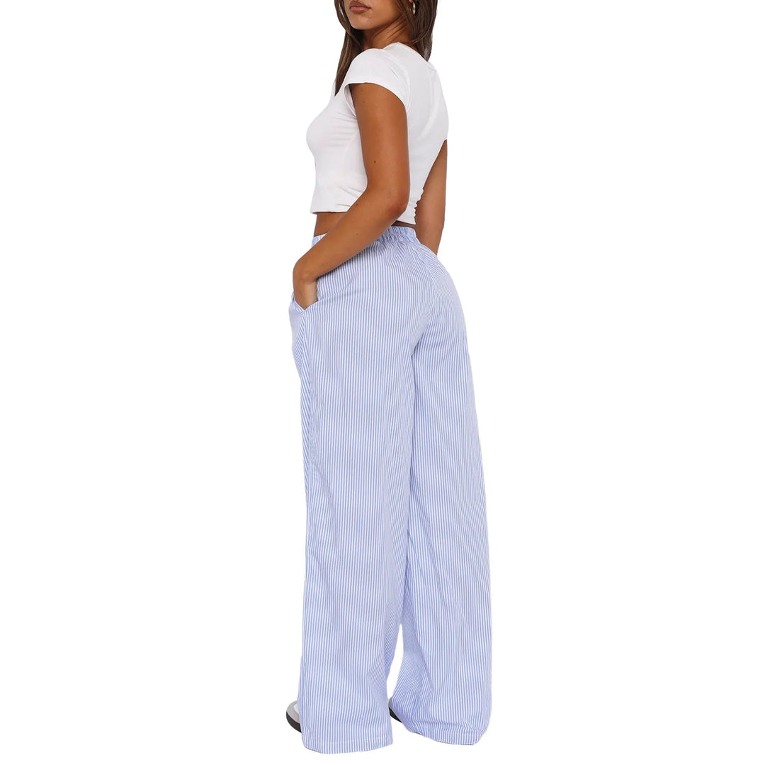 Pantalon femme rayé confortable, taille élastique. Jogging décontracté parfait pour la maison ou le sport.