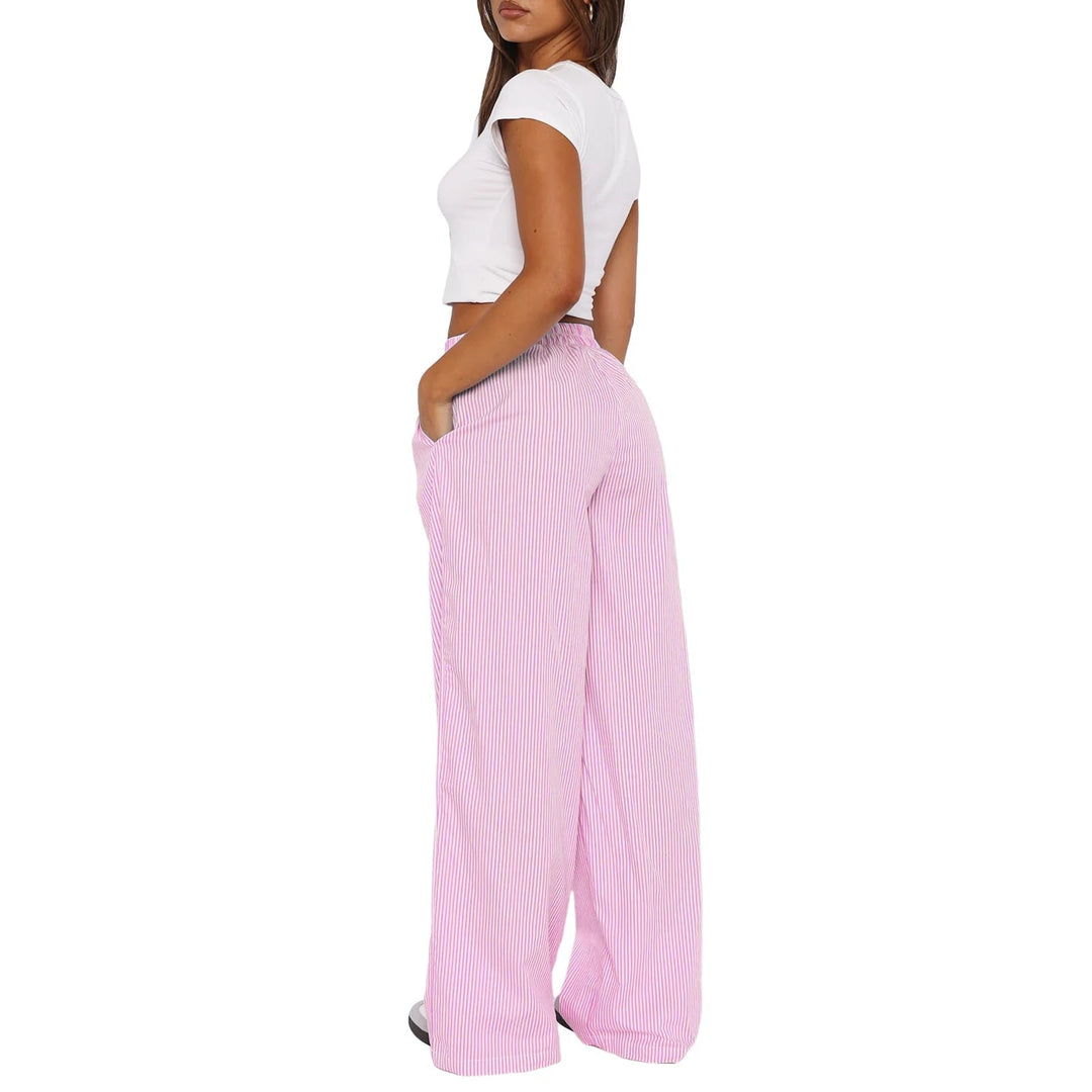 Détail du pantalon de jogging femme rayé, taille élastique confortable, coupe ample et moderne.