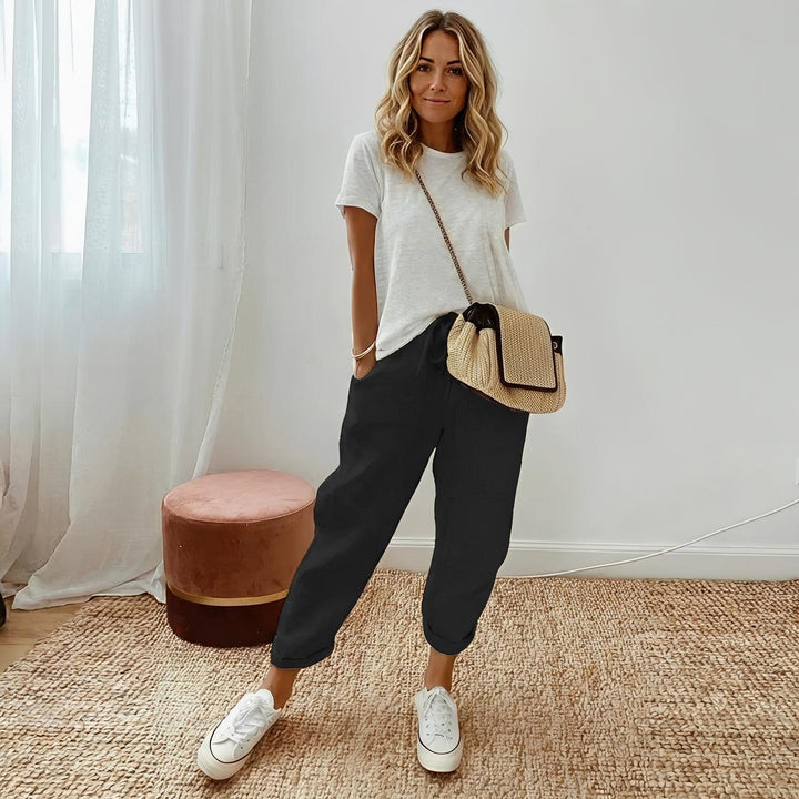 Pantalon casual femme en lin fluide, coupe large et légère, idéal pour le confort d'été.