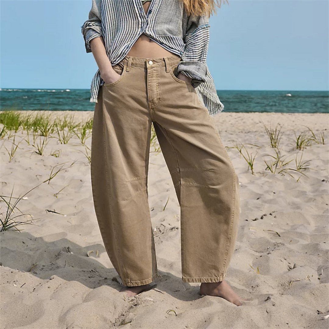 Pantalon large en denim femme, élégant et polyvalent, idéal pour les journées de printemps.