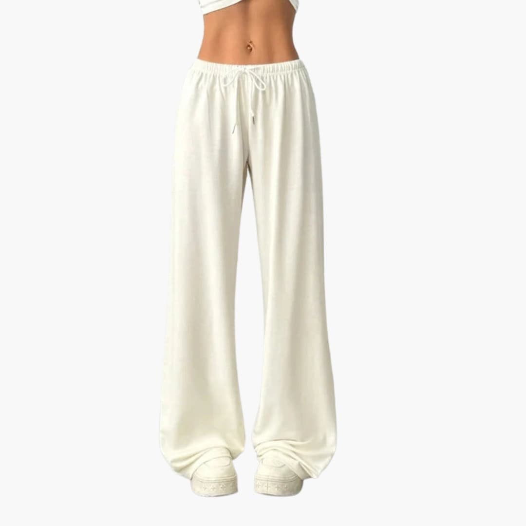 Pantalon large fluide pour femmes, taille élastique, offrant confort et style. Idéal pour la mode décontractée.