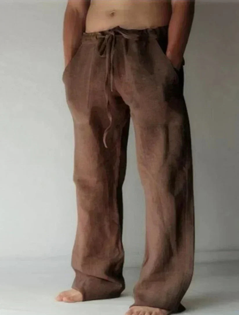 Pantalon fluide homme, coupe large. Confort élégant pour une mode masculine décontractée. Vêtement léger.