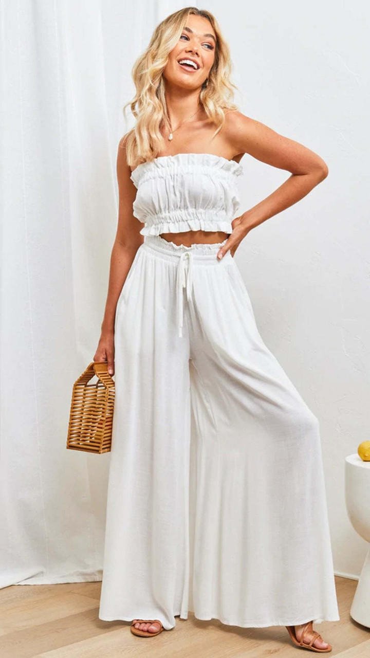 Pantalon large taille haute femme en Tencel, parfait pour un look mode estival.