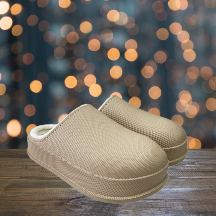 Pantoufles douces et chaudes pour femme, procurant un confort optimal à la maison pendant l'hiver.