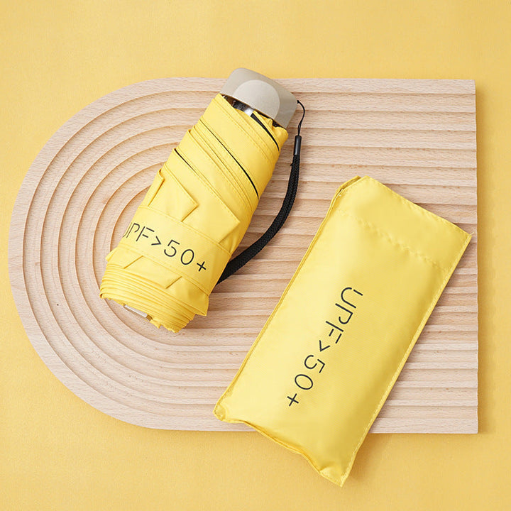 Parapluie femme résistant et durable, compact pour sac à main, protection anti-UV et pluie forte.