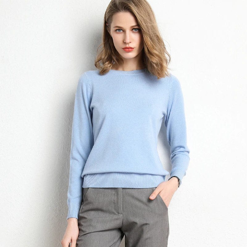 Pull femme chaud et doux, col rond, tricoté pour un confort optimal automne-hiver, style intemporel.