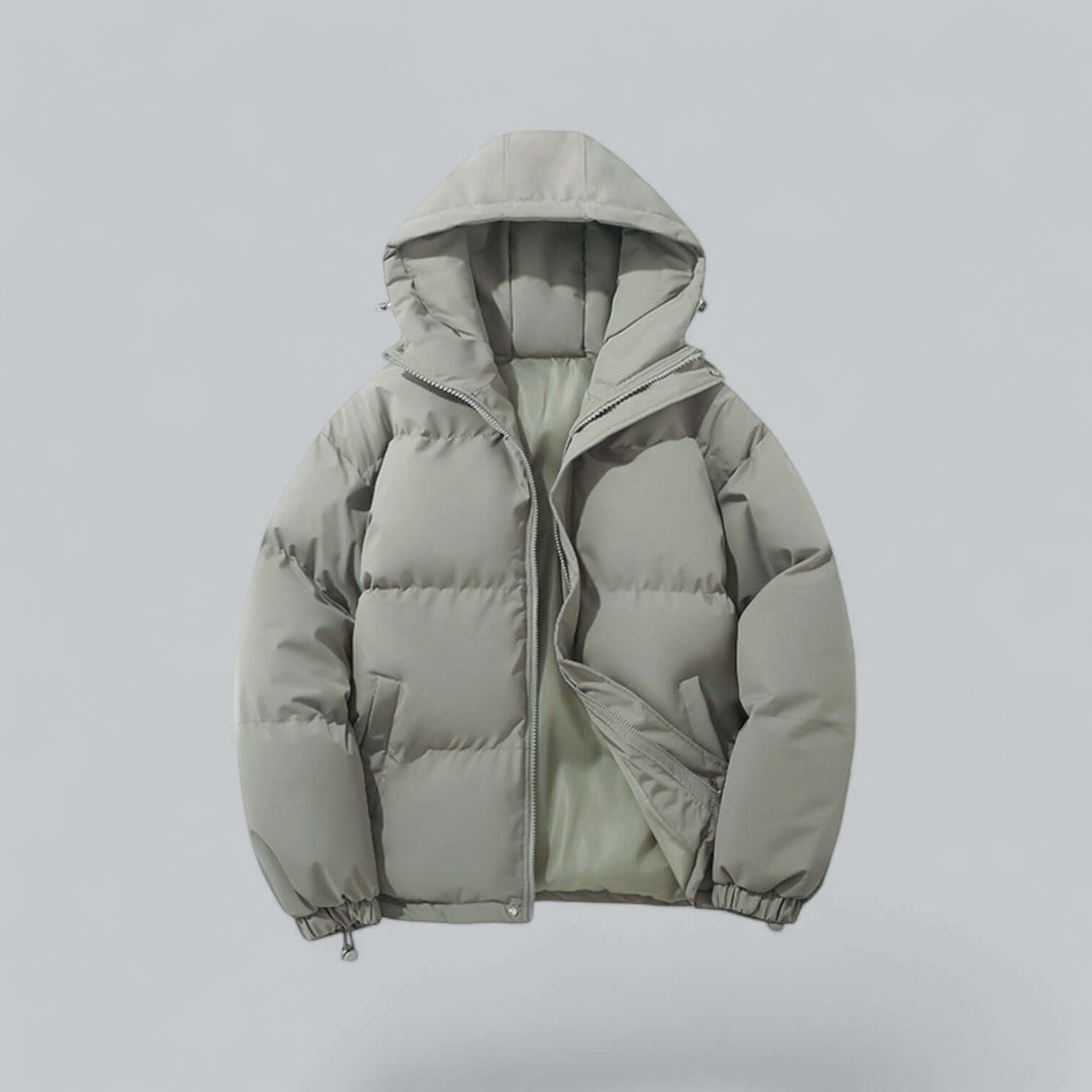 Détail de la capuche réglable d'une parka hiver homme, offrant chaleur et protection coupe-vent.