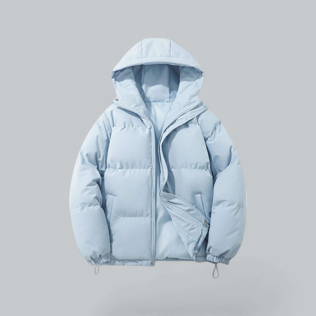 Homme portant une parka d'hiver chaude, coupe-vent, avec capuche, parfaite pour le grand froid urbain.