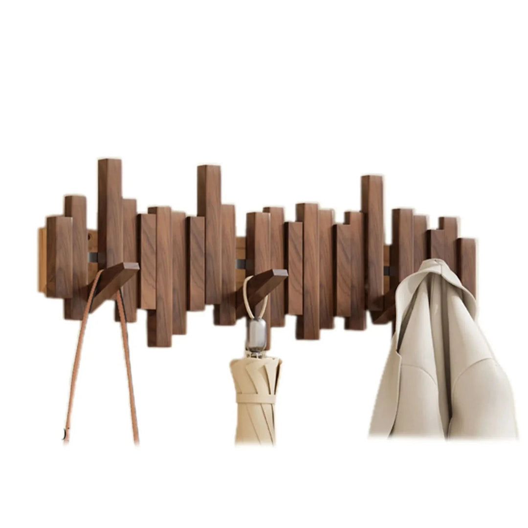 Patère murale design piano en bois de noyer noir, 5 crochets escamotables pour entrée élégante.