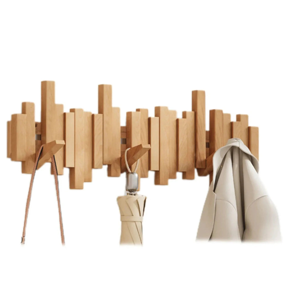 Rangement mural élégant : patère design piano en bois de hêtre naturel, crochets rabattables.