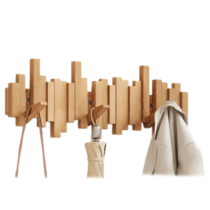 Rangement mural élégant : patère design piano en bois de hêtre naturel, crochets rabattables.