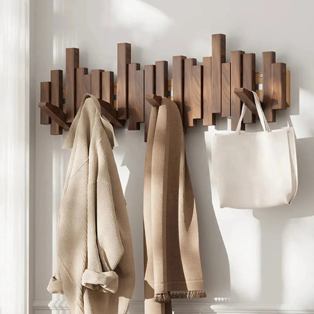 Support mural design piano en bois de noyer, 7 crochets escamotables pour sacs et manteaux.
