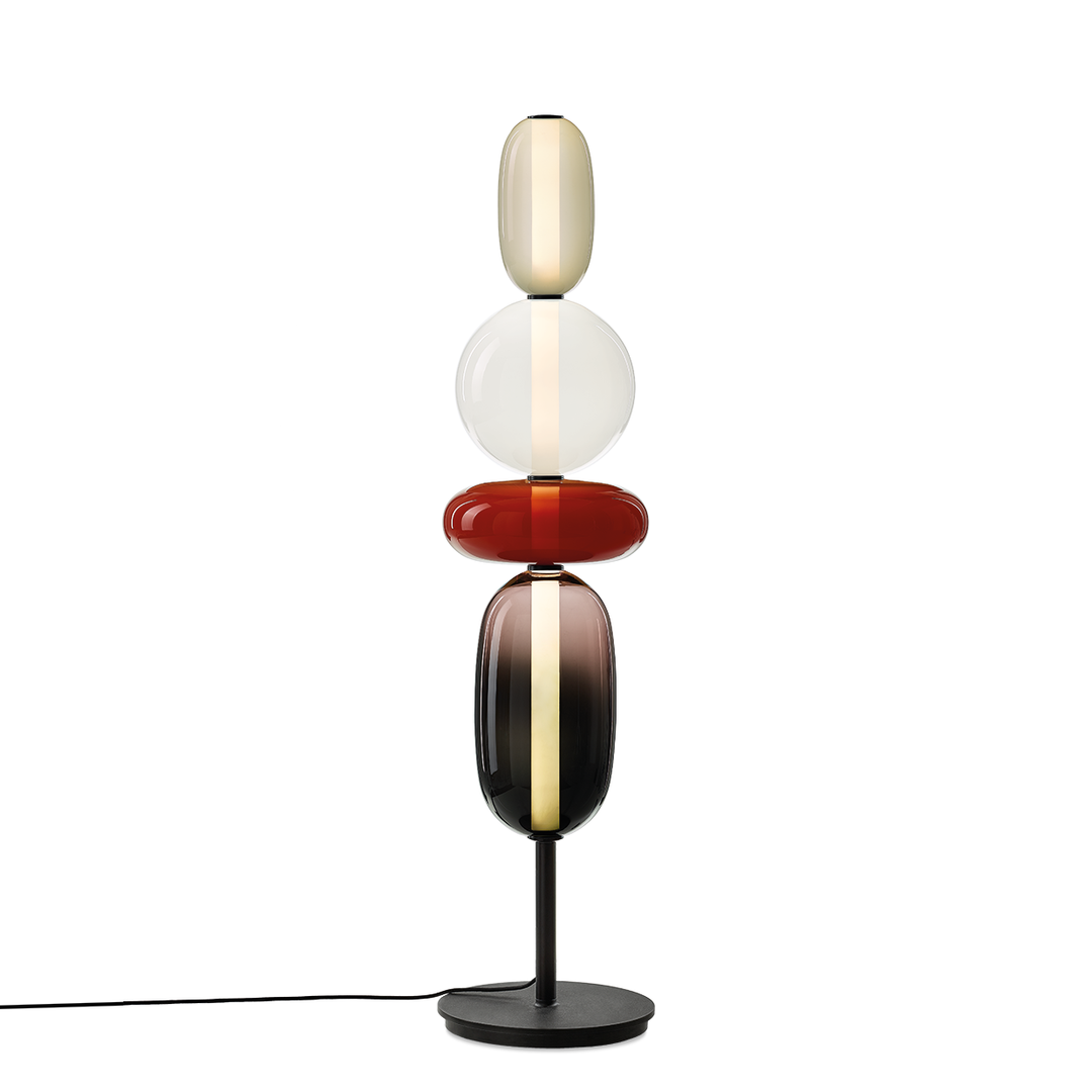 Lampe sur pied design en verre coloré, éclairage d'ambiance moderne pour salon.