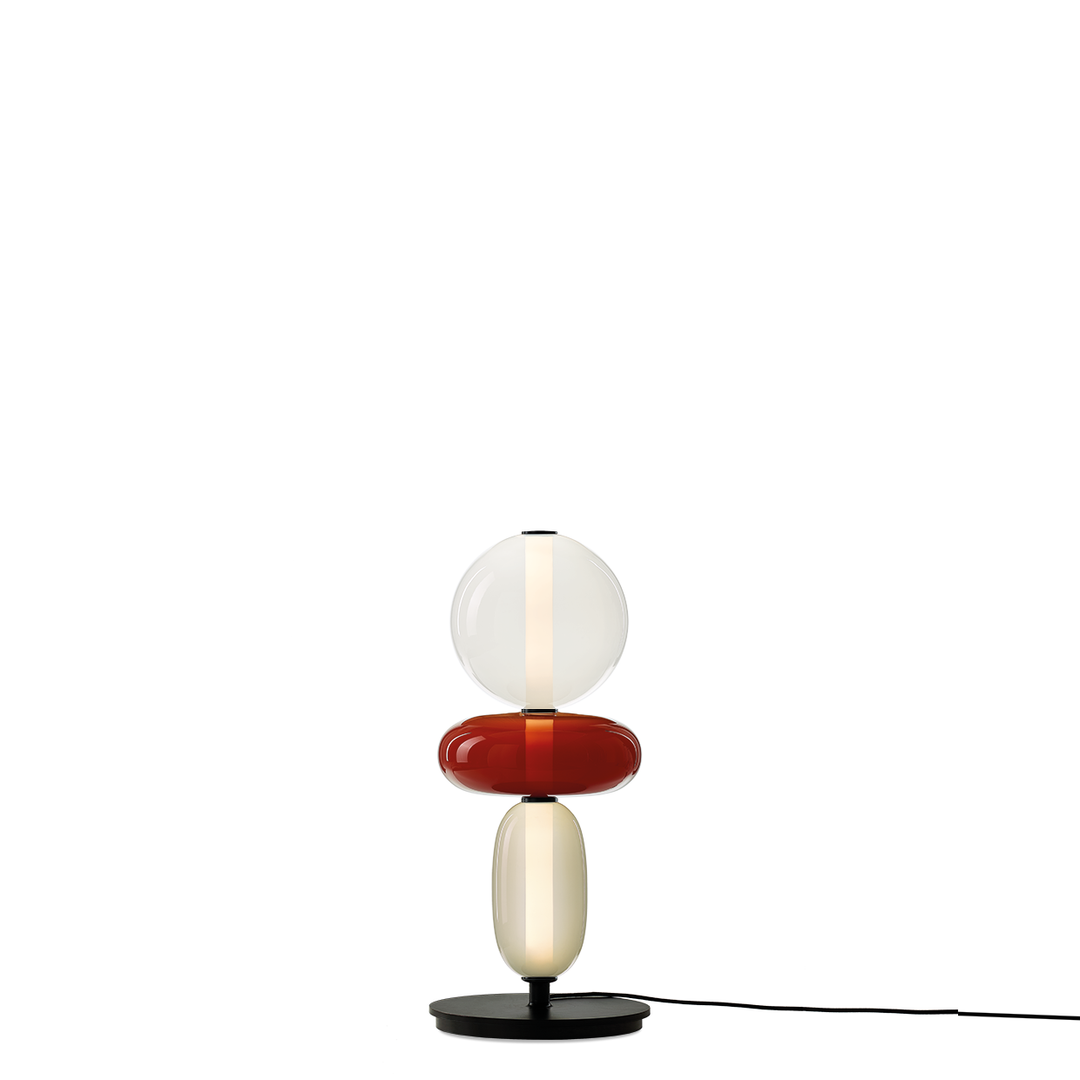 Élégante lampe sur pied design, verre coloré pour une touche de style dans votre maison.