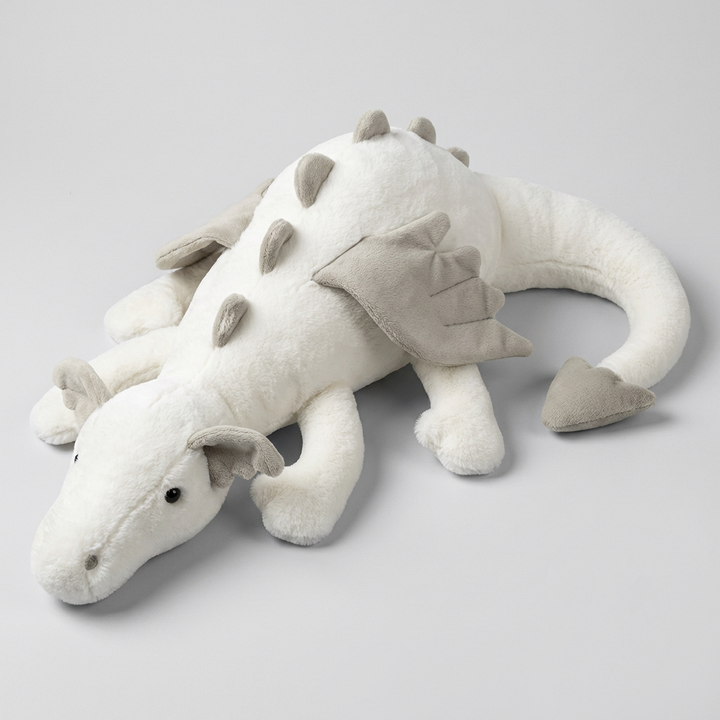 Adorable peluche dragon ailé, un jouet doux avec des ailes détaillées, parfait pour les jeunes fans de fantasy.