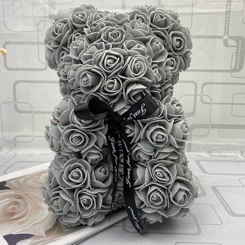 Nounours rose artificiel PetalCuddle, cadeau unique pour femme, amour durable.