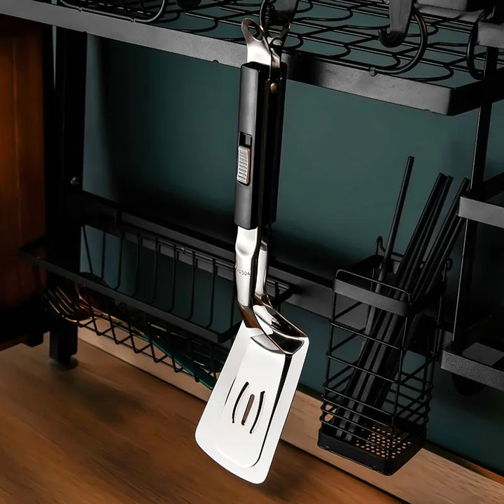 Pince spatule barbecue inox 2 en 1. Saisissez et retournez burgers, saucisses, légumes sur le grill.